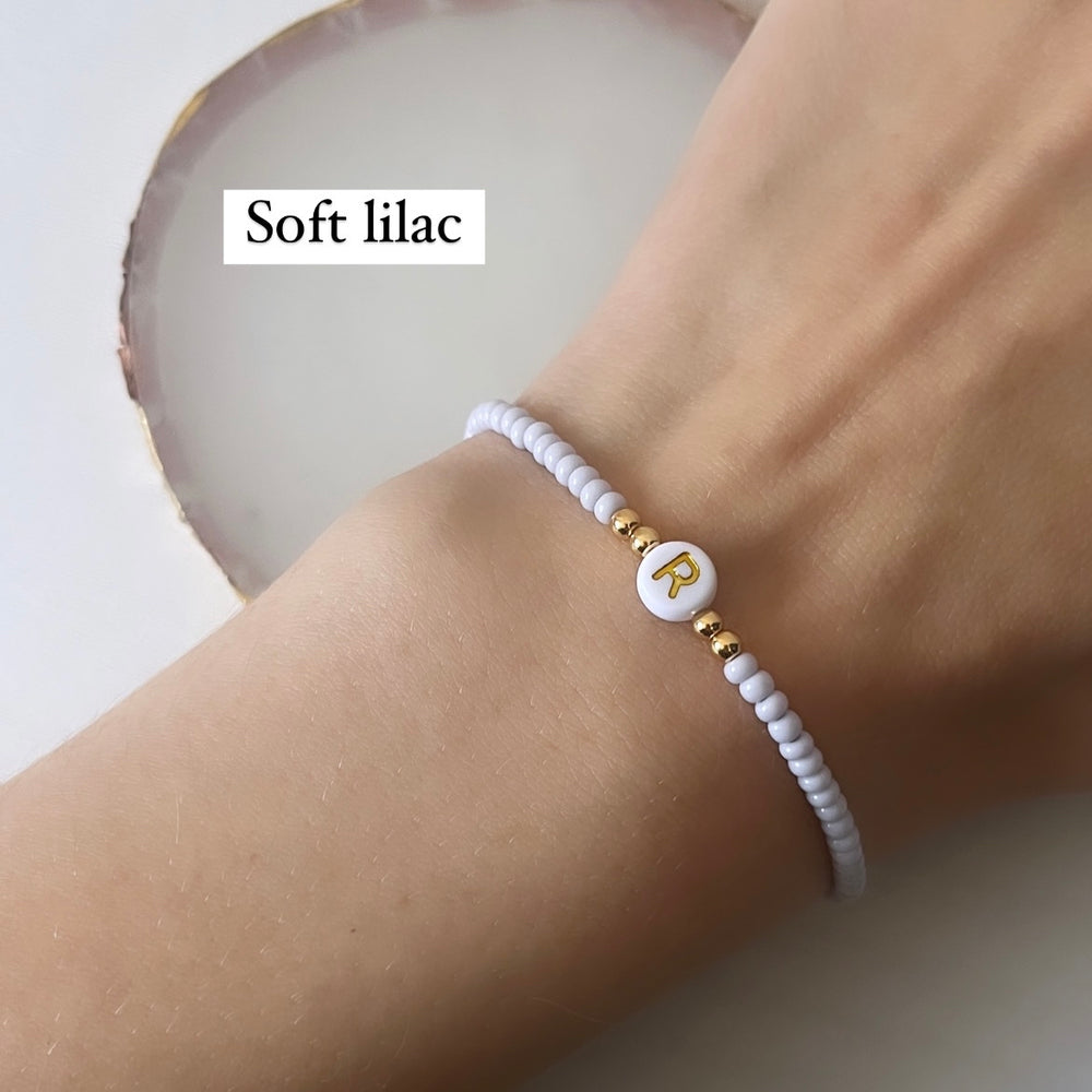 
                      
                        Minimalist neutral initial bracelet - Positively Beaded
                      
                    