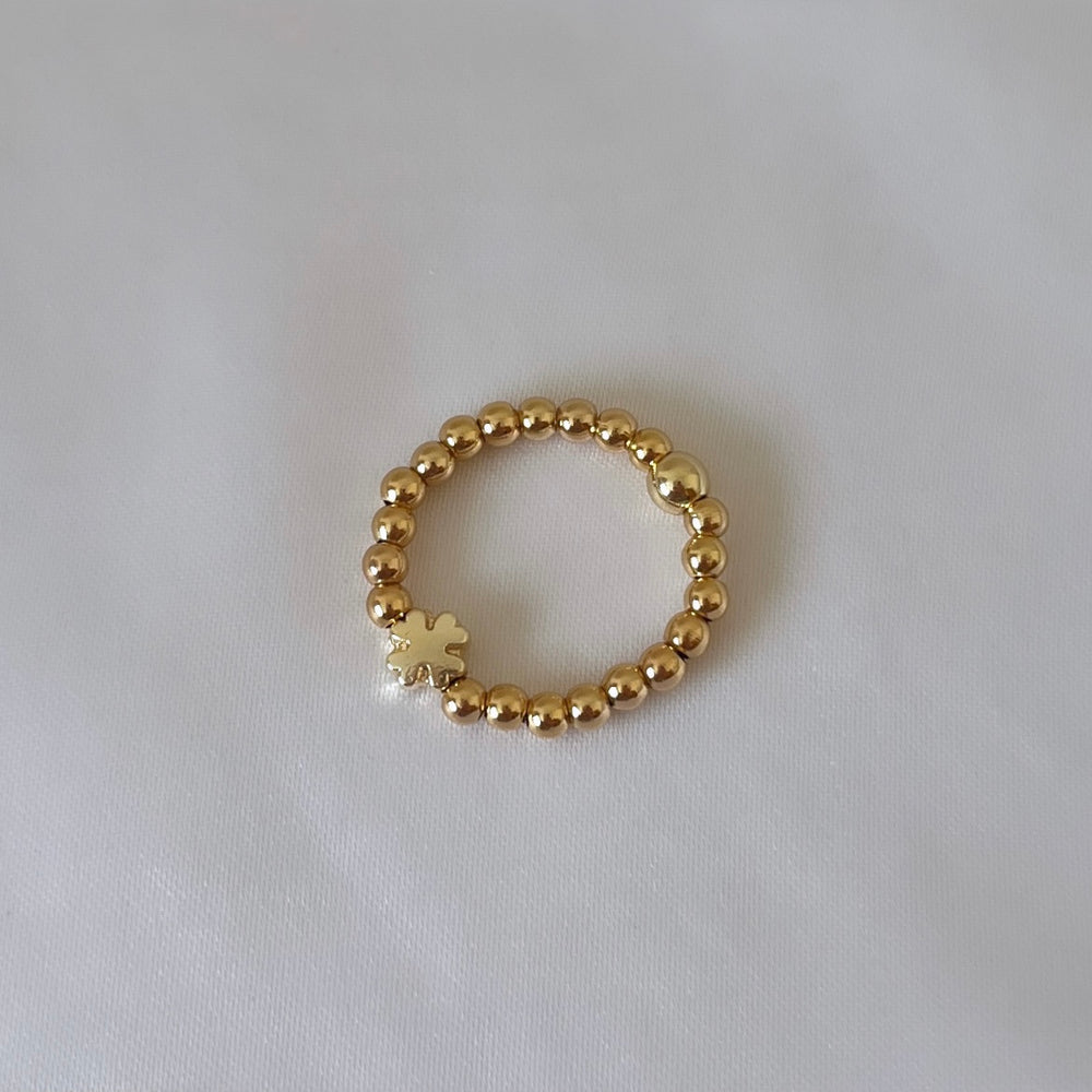 
                      
                        Gold four leaf clover ring
                      
                    