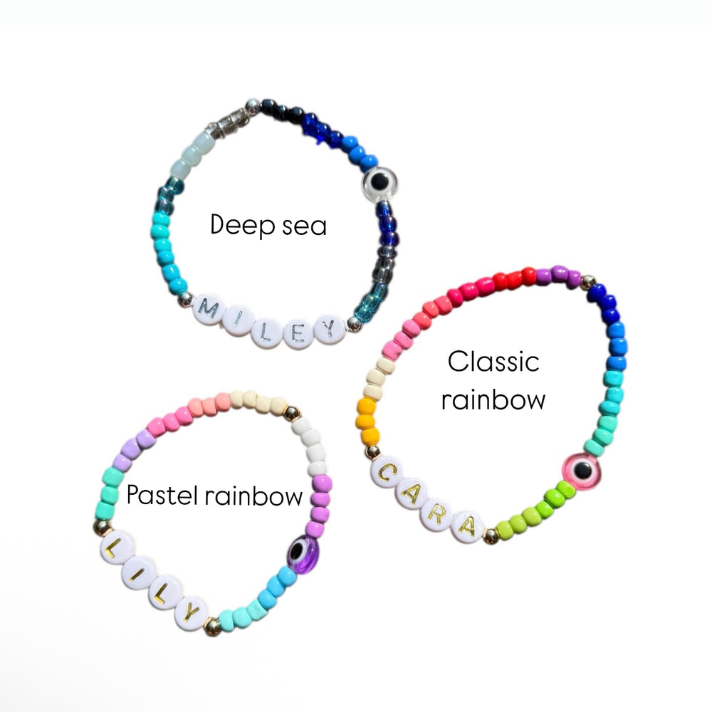 
                      
                        4mm Seed Bead Eye Name Bracelet - Rainbow Mix - Positively Beaded
                      
                    
