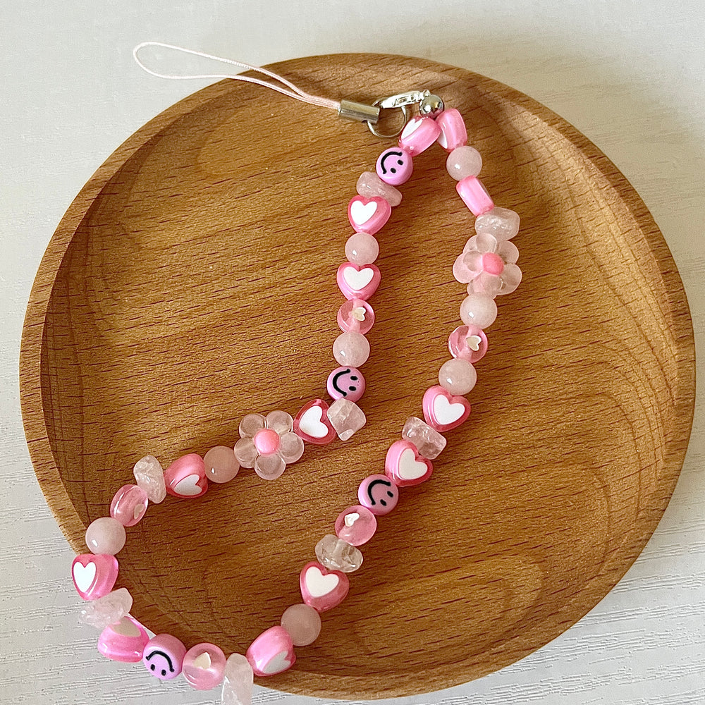 
                      
                        Beaded phone strap - eclectic pink smile
                      
                    