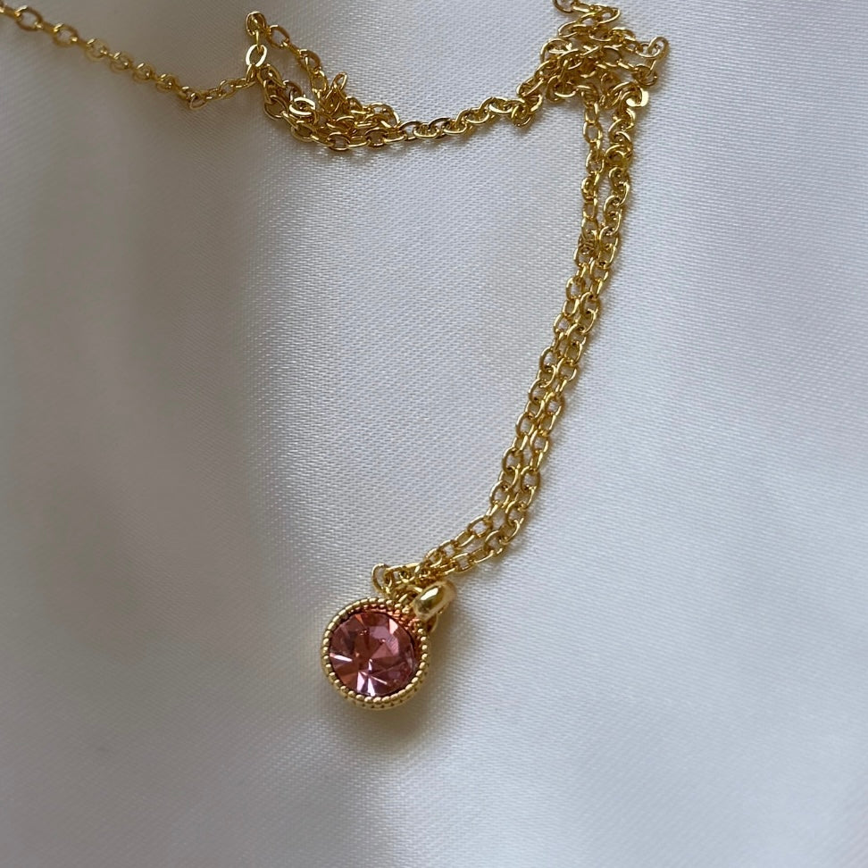 
                      
                        Gold plated pink gemstone necklace
                      
                    