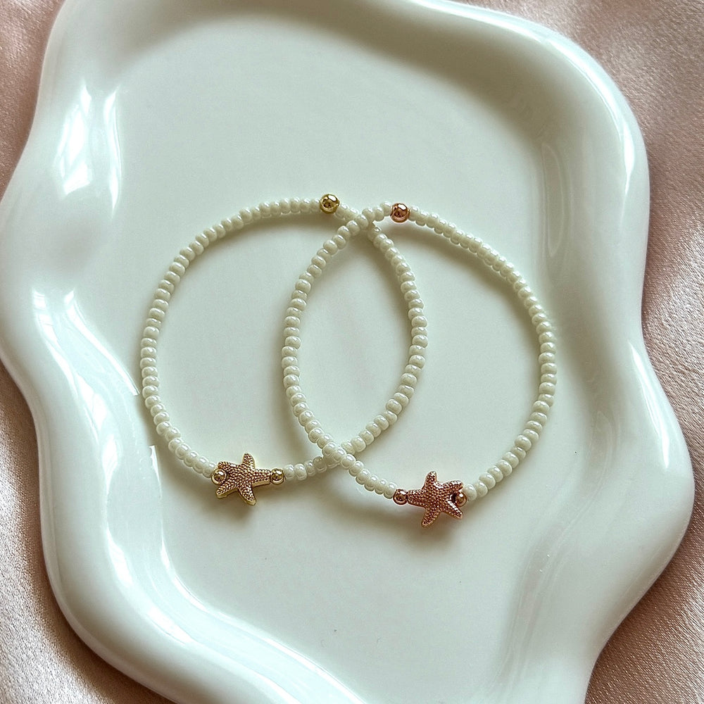 
                      
                        Starfish charm bracelet
                      
                    