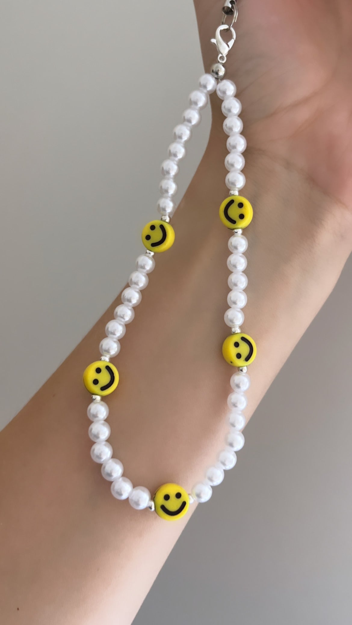 Beaded phone strap - smile and pearl