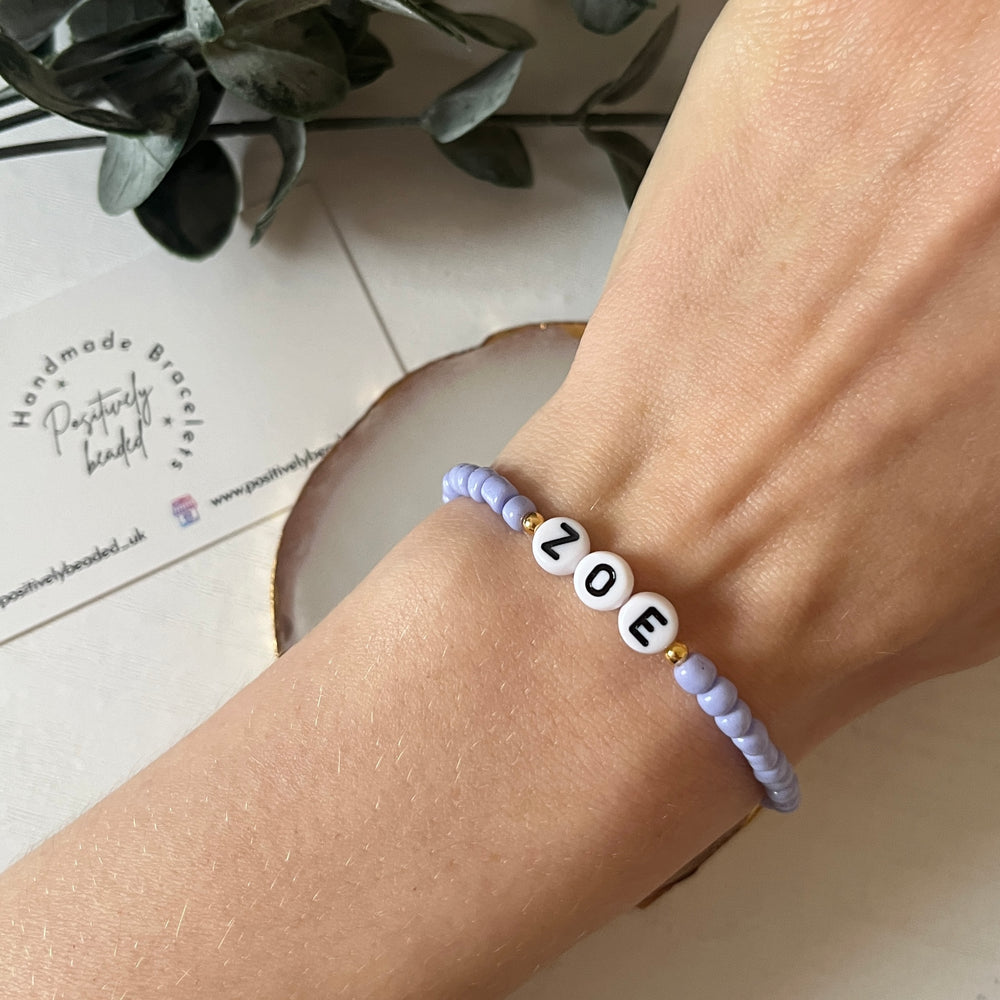 
                      
                        Classic name bracelet - iris blue
                      
                    