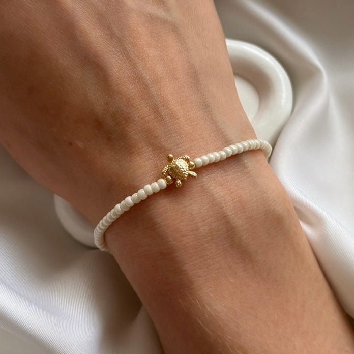 Delicate gold plated turtle charm stacking bracelet