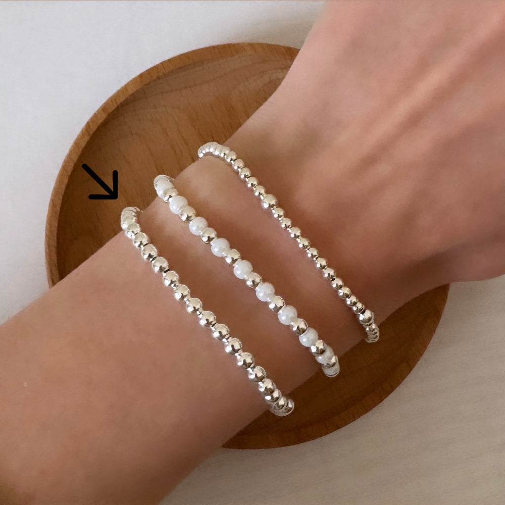 
                      
                        Simple silver beaded bracelet
                      
                    