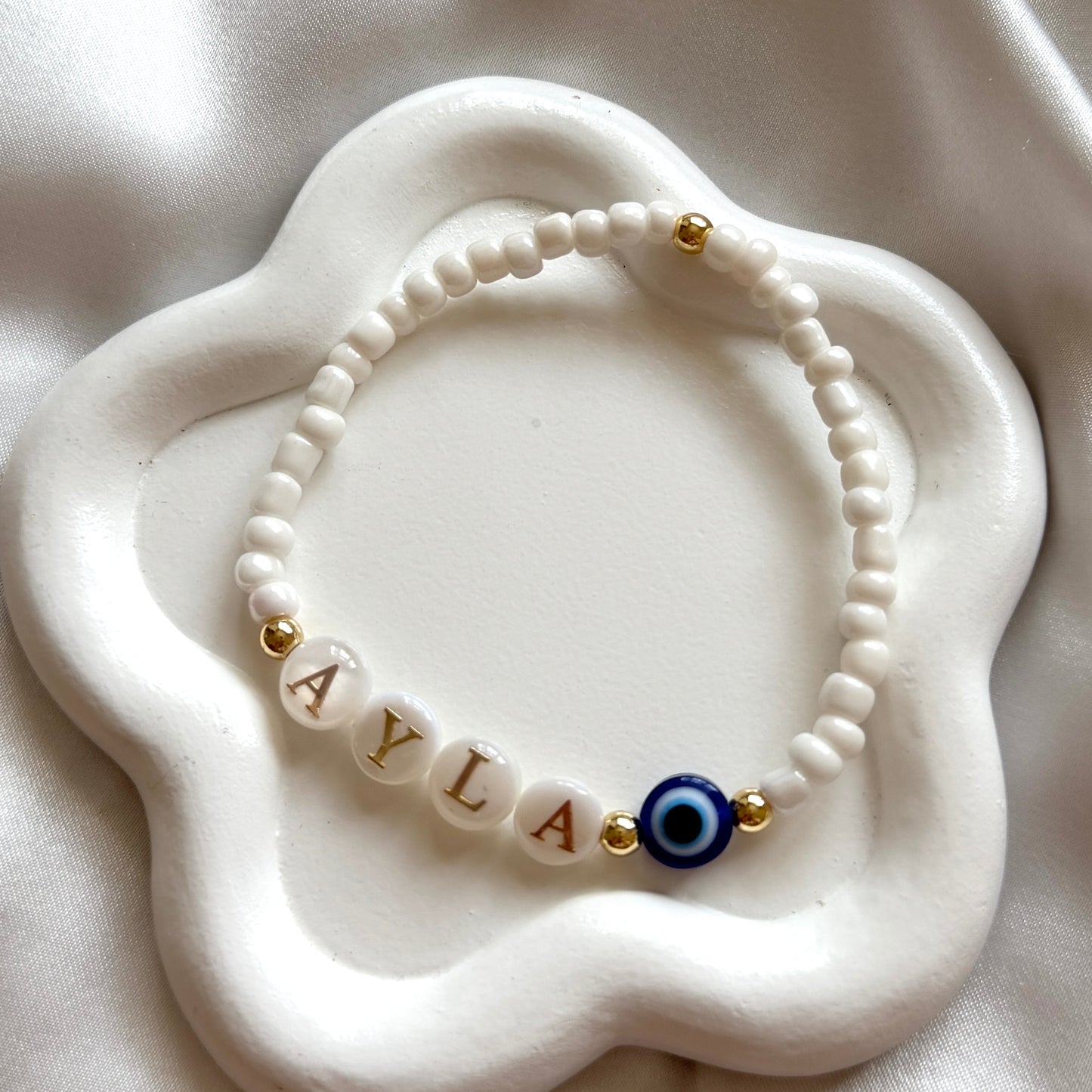 Freshwater pearl evil eye name bracelet - Positively Beaded