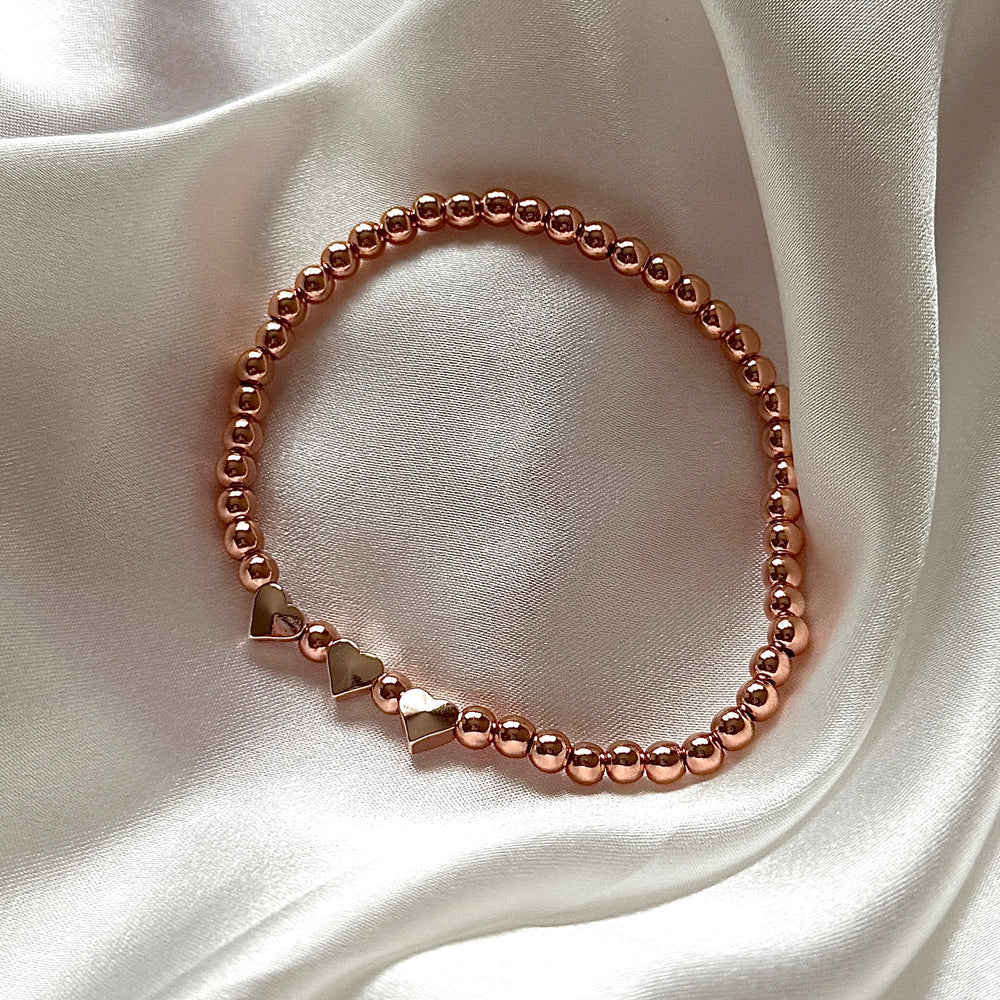 
                      
                        Triple heart bead bracelet - gold, silver, rose gold
                      
                    