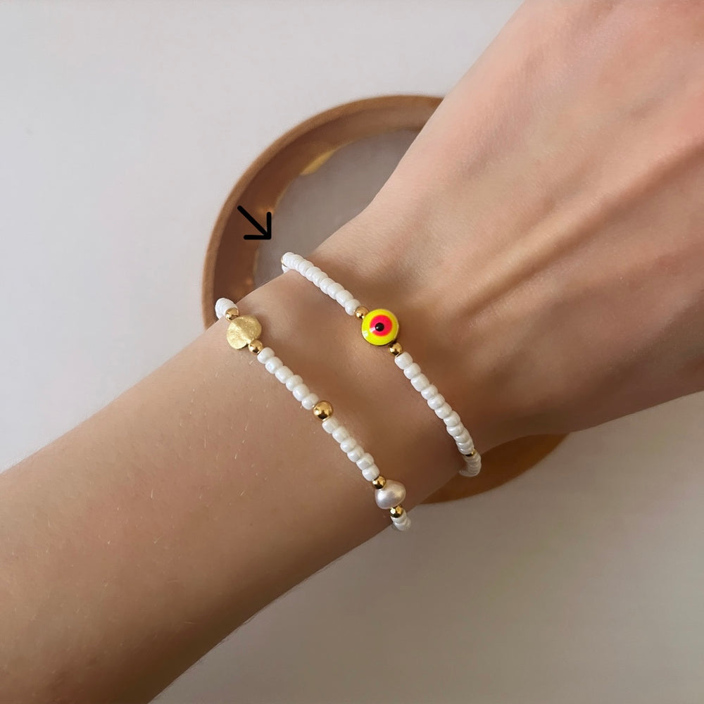 
                      
                        Yellow and pink evil eye stacking bracelet
                      
                    