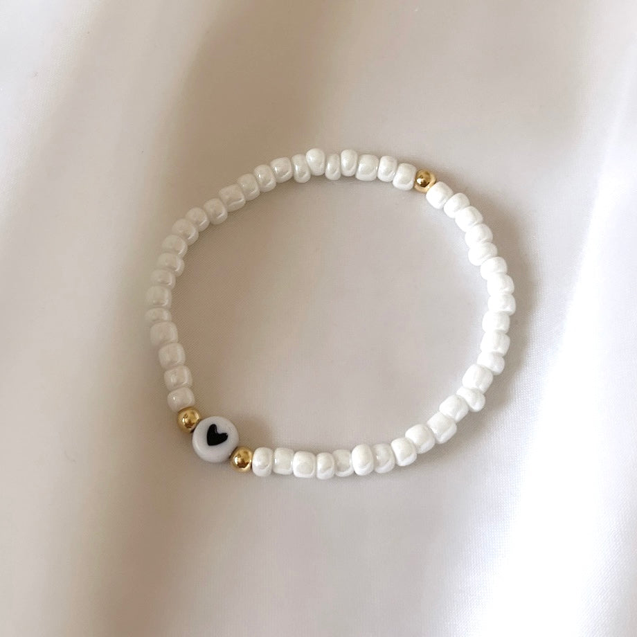 
                      
                        Simple heart stacking bracelet - pearl white
                      
                    