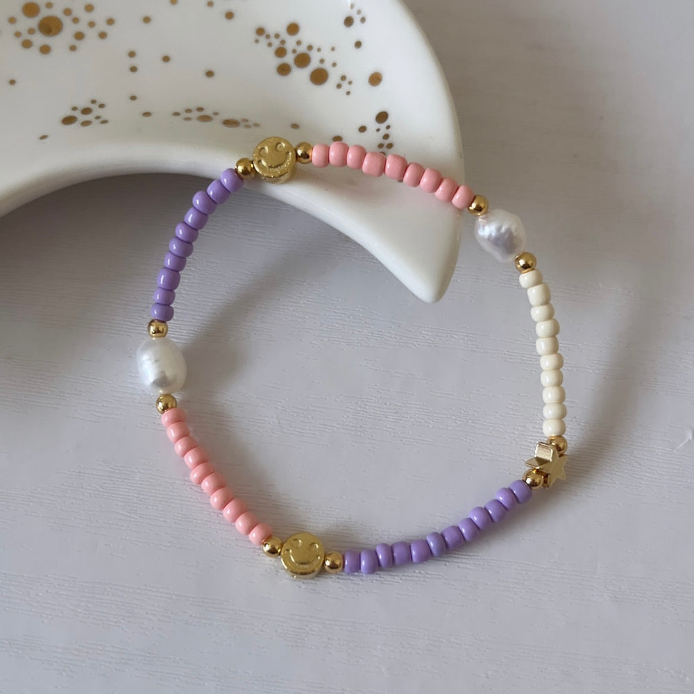 
                      
                        Eclectic pastel symbol bracelet
                      
                    