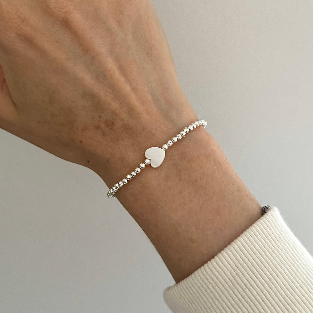 
                      
                        Single pearl heart 3mm stacking bracelet
                      
                    