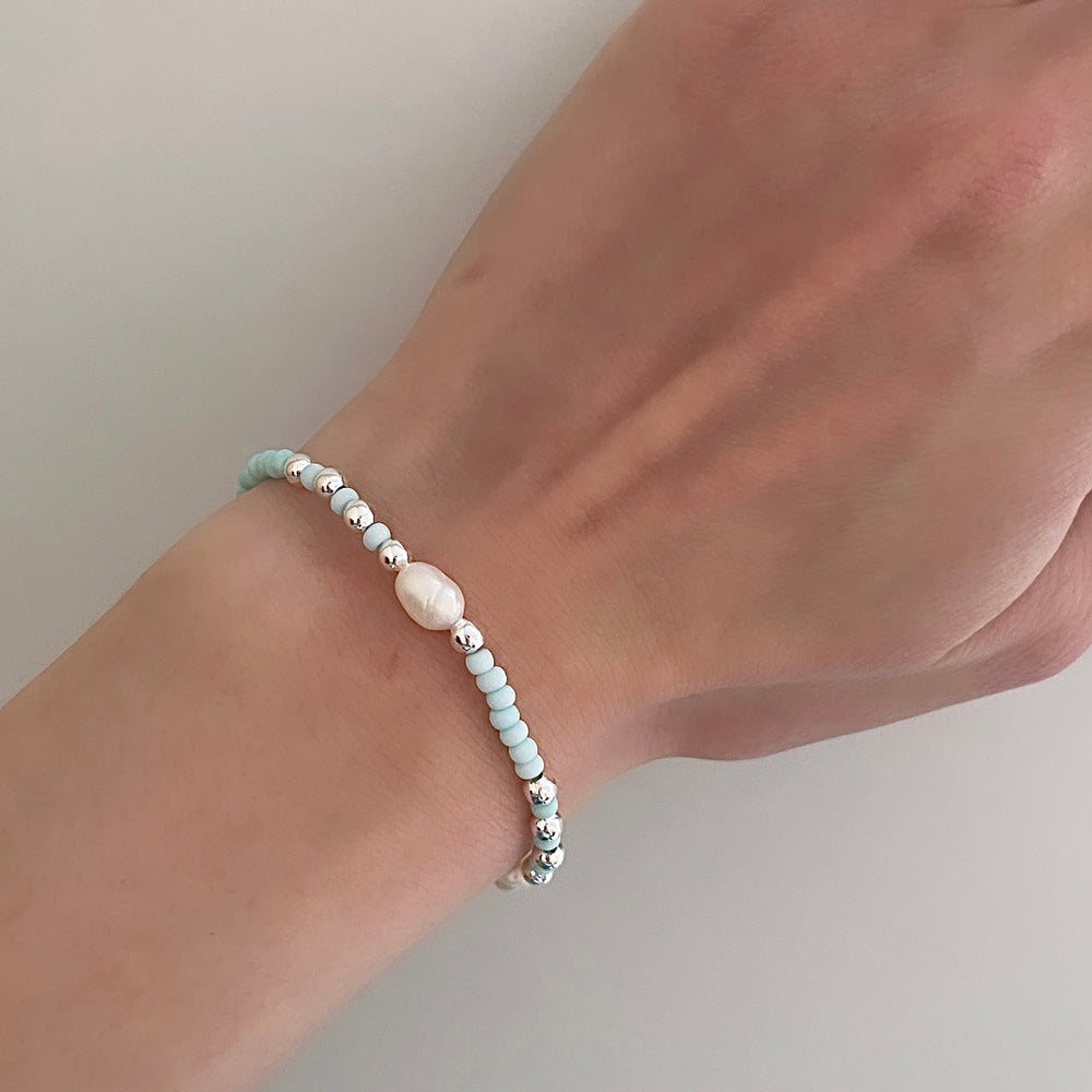 
                      
                        Pastel pearl beaded bracelet
                      
                    