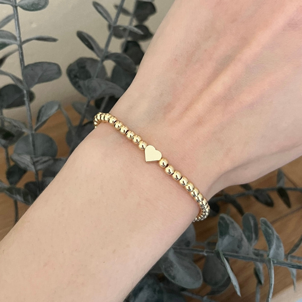 
                      
                        Simple gold heart bracelet
                      
                    