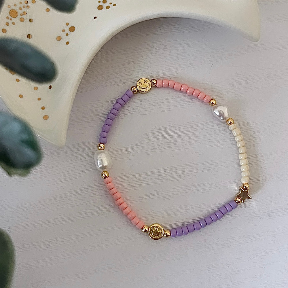 
                      
                        Eclectic pastel symbol bracelet
                      
                    