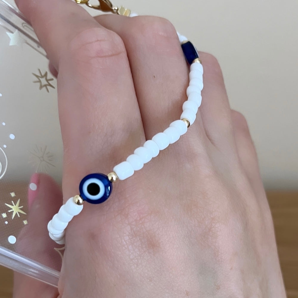 
                      
                        Beaded phone strap - evil eye
                      
                    