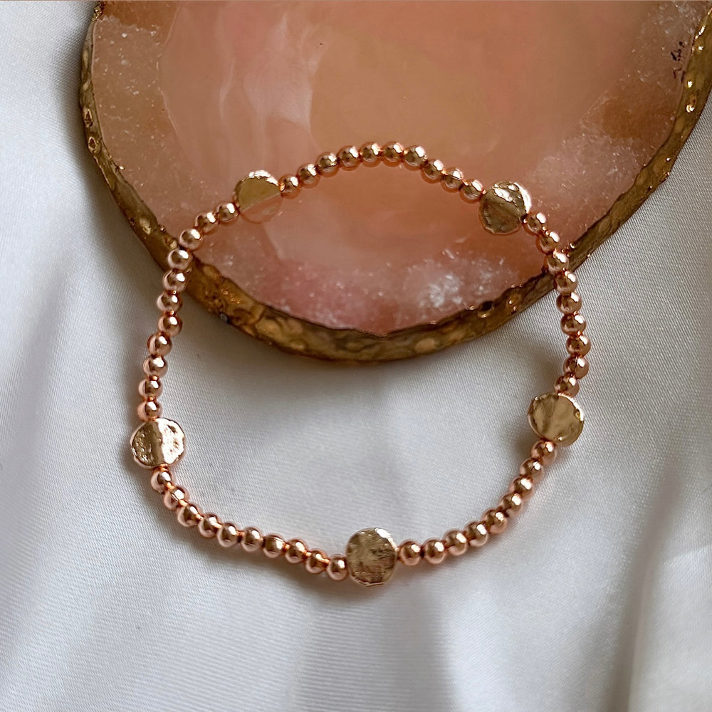 Rose gold textured disc bead bracelet