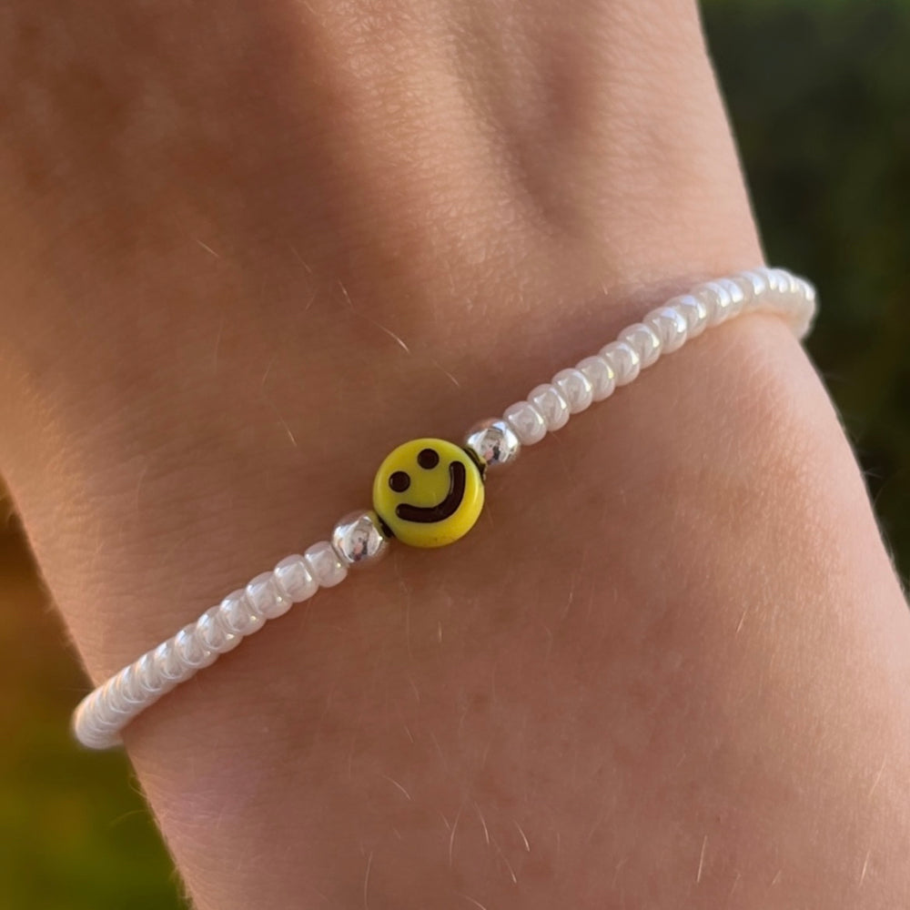 
                      
                        Yellow smiley stacking bracelet
                      
                    