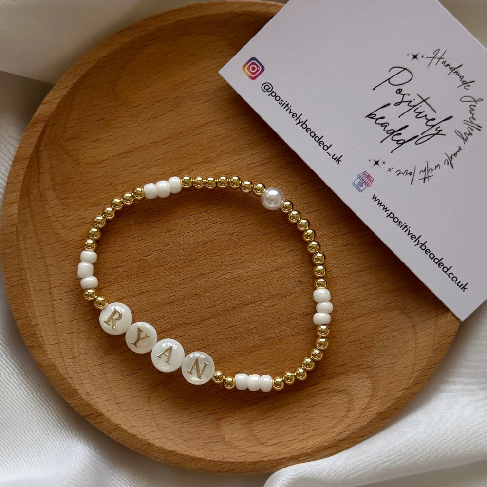 Freshwater pearl and gold name bracelet