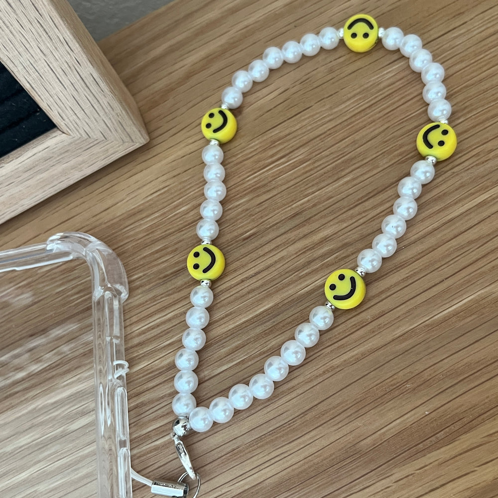 
                      
                        Beaded phone strap - smile and pearl
                      
                    