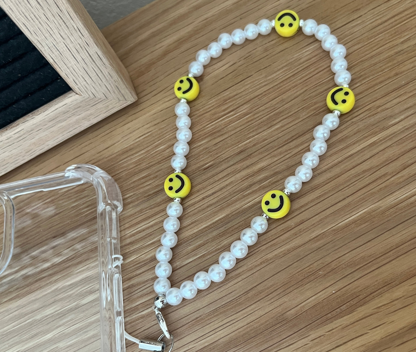 Beaded phone strap - smile and pearl