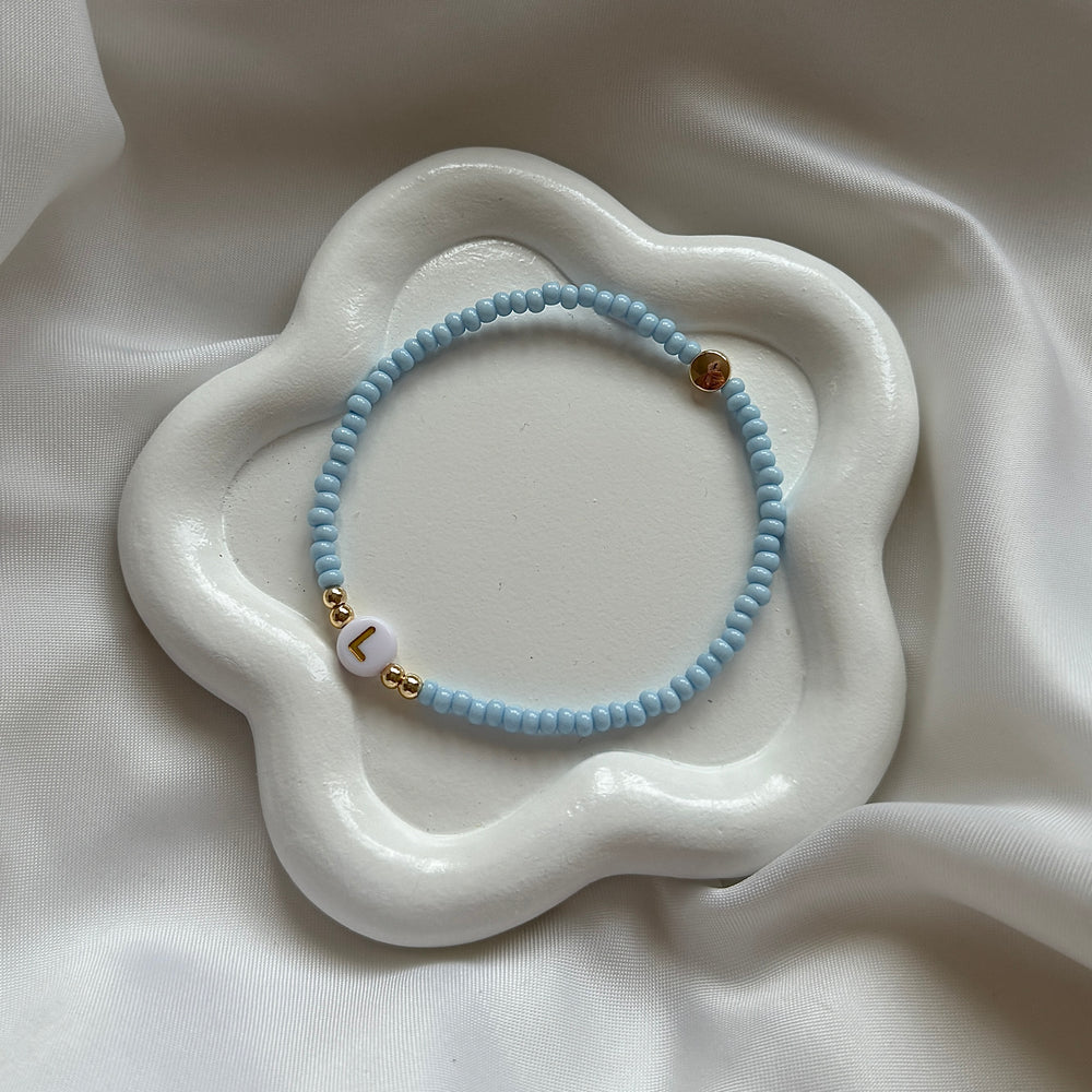 
                      
                        Minimalist neutral initial bracelet - Positively Beaded
                      
                    