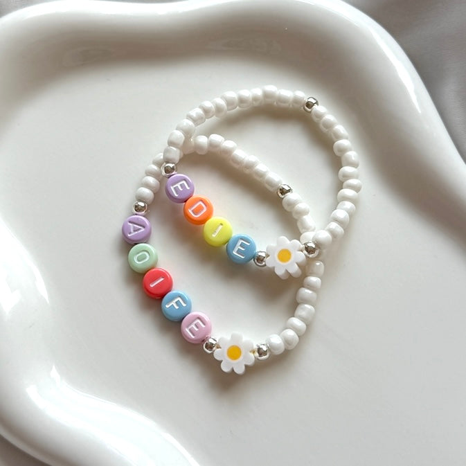 
                      
                        Kids' Multicolour Daisy Name Bracelet - Positively Beaded
                      
                    