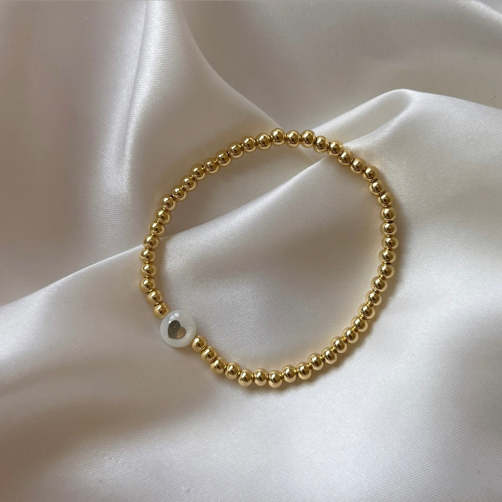 
                      
                        Freshwater pearl gold heart bracelet
                      
                    