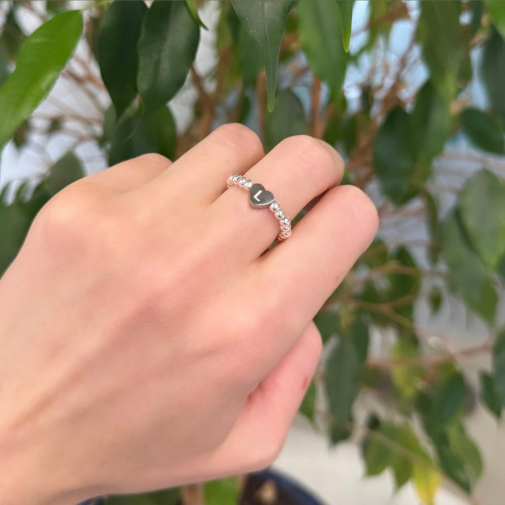 
                      
                        Dainty sterling silver engraved initial ring - Positively Beaded
                      
                    