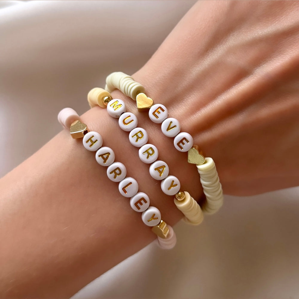 
                      
                        Heishi clay bead name bracelet - gold or silver lettering
                      
                    