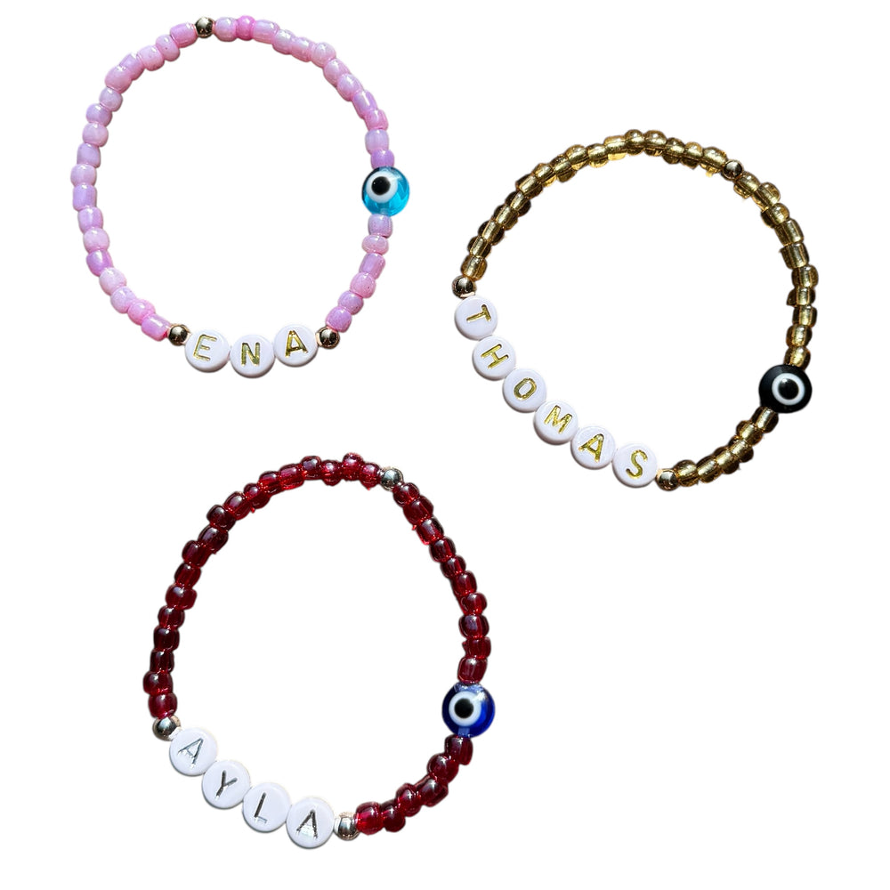 
                      
                        4mm Seed Bead Eye Name Bracelet - Positively Beaded
                      
                    