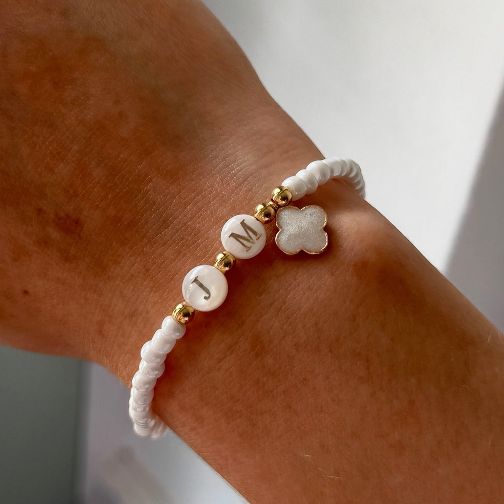 
                      
                        Freshwater pearl and clover name bracelet - Positively Beaded
                      
                    