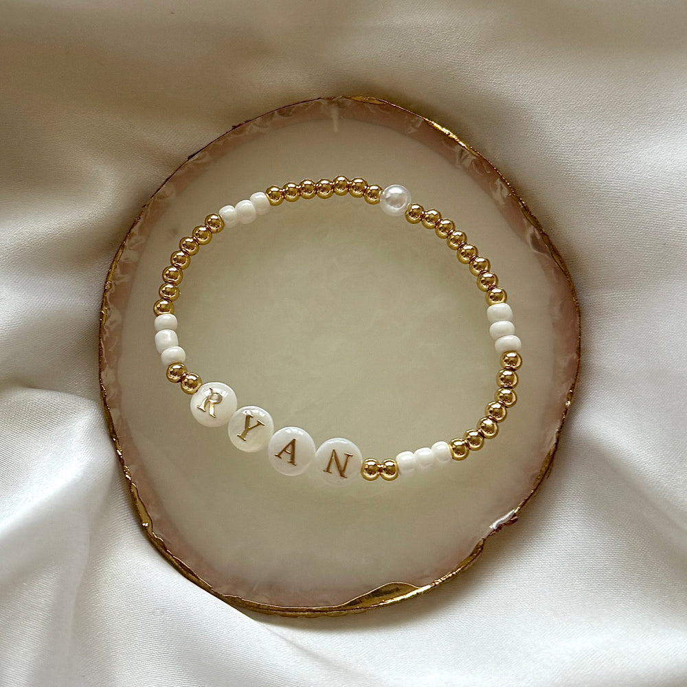 Freshwater pearl and gold name bracelet