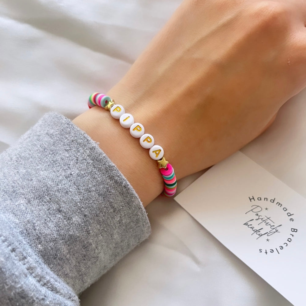 
                      
                        Rainbow and gold personalised heishi bracelet
                      
                    