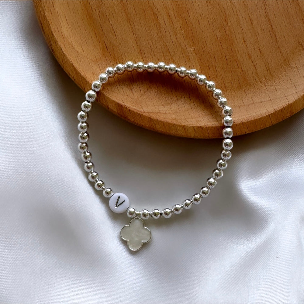 
                      
                        Silver clover charm initial bracelet
                      
                    