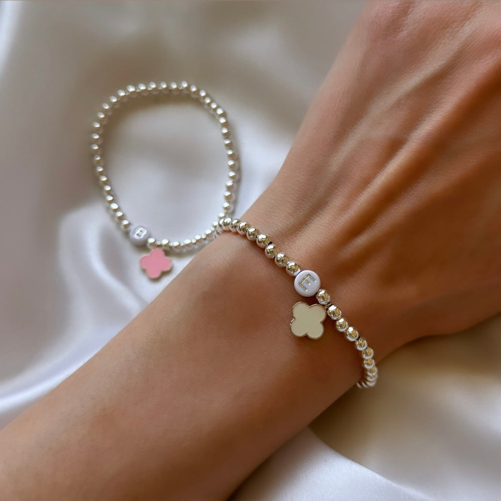 
                      
                        Silver clover charm initial bracelet
                      
                    