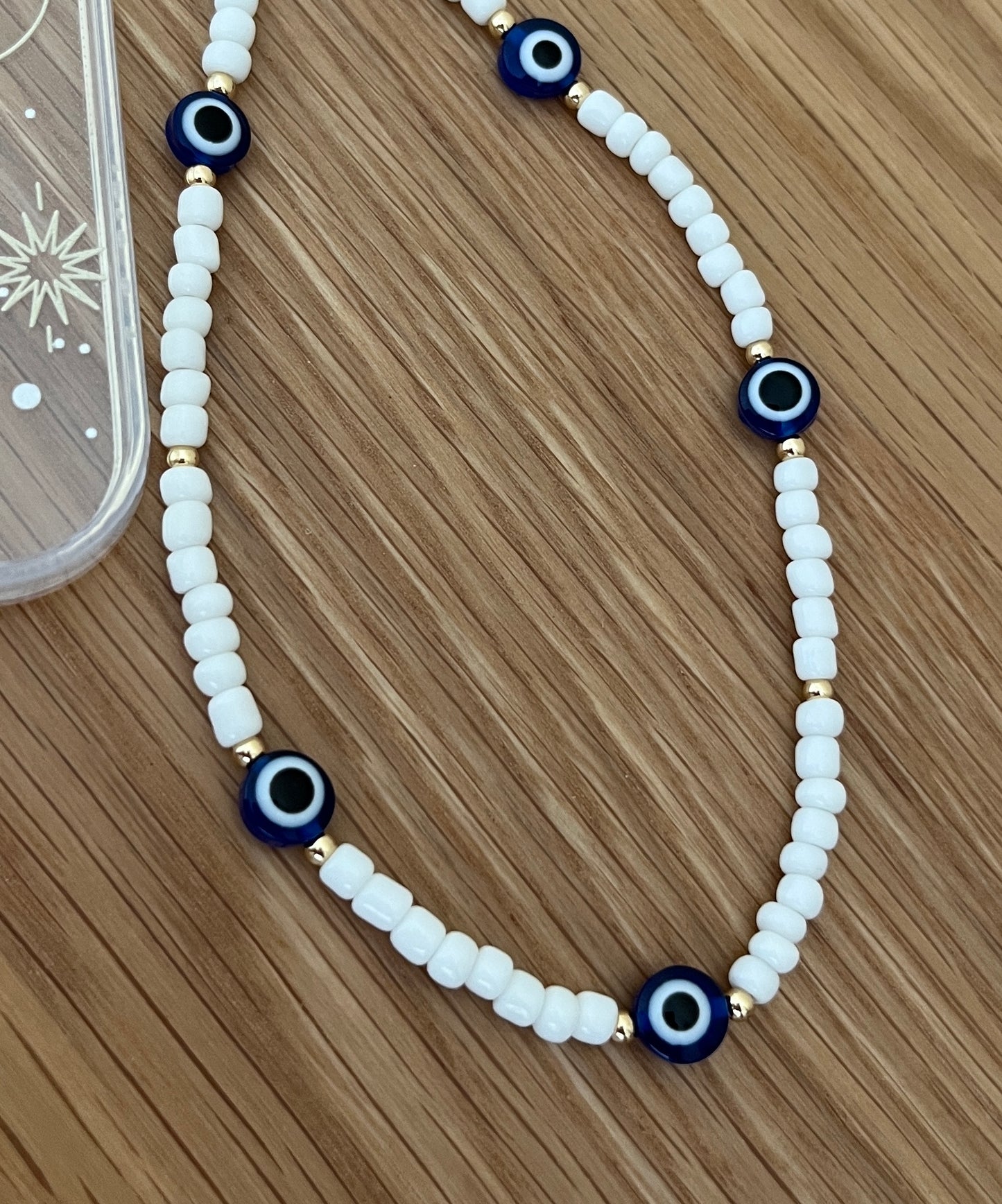 Beaded phone strap - evil eye