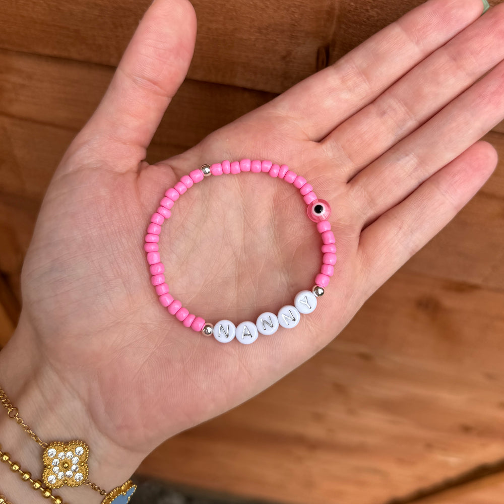 
                      
                        4mm Seed Bead Eye Name Bracelet - Positively Beaded
                      
                    