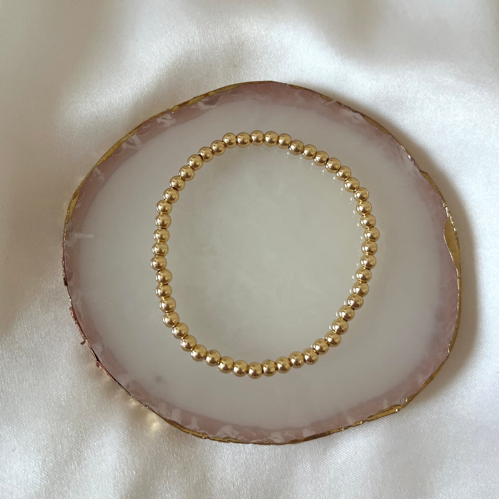 Simple gold beaded bracelet