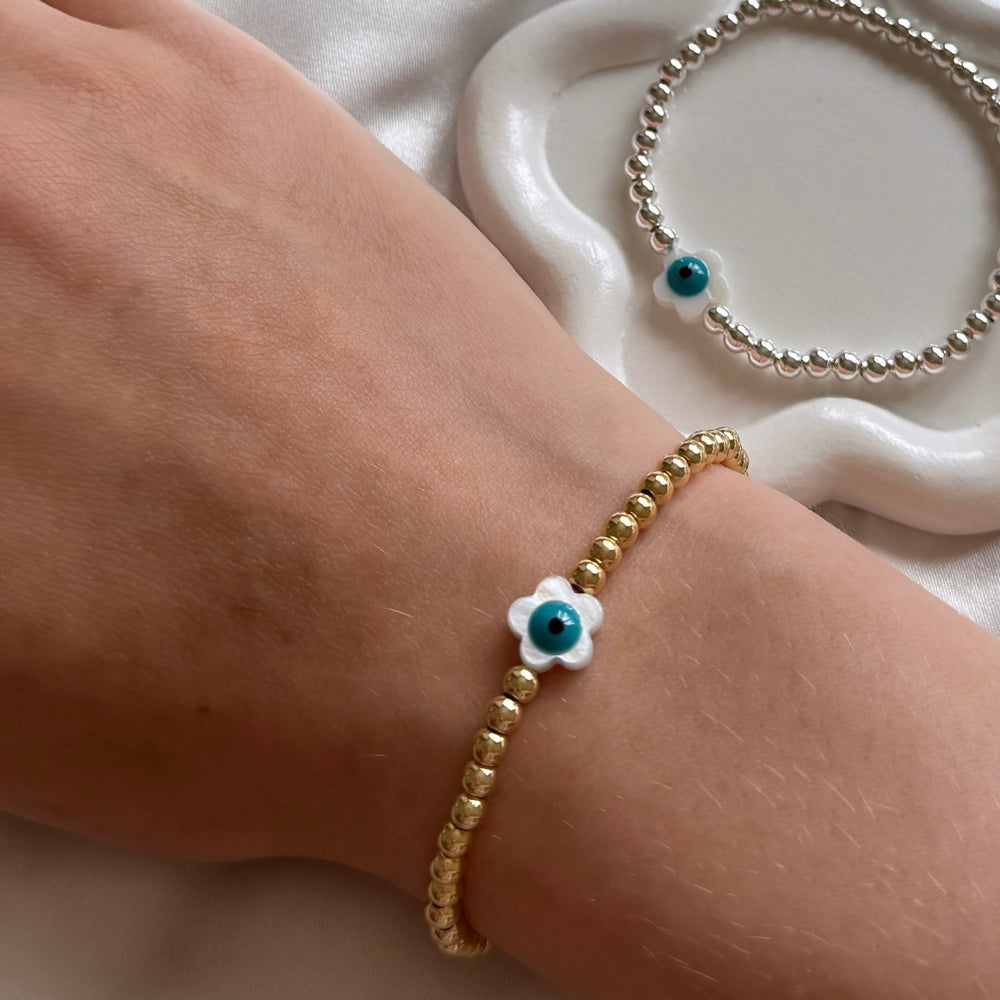 
                      
                        Evil eye pearl flower bracelet - Positively Beaded
                      
                    