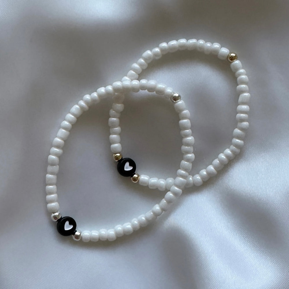 
                      
                        Simple heart stacking bracelet - pearl white
                      
                    