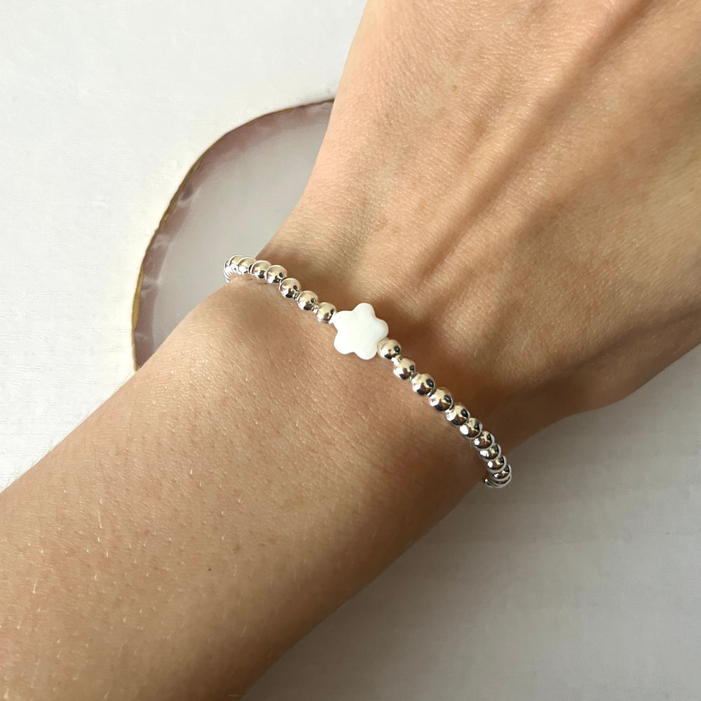 
                      
                        Pearl flower beaded bracelet
                      
                    