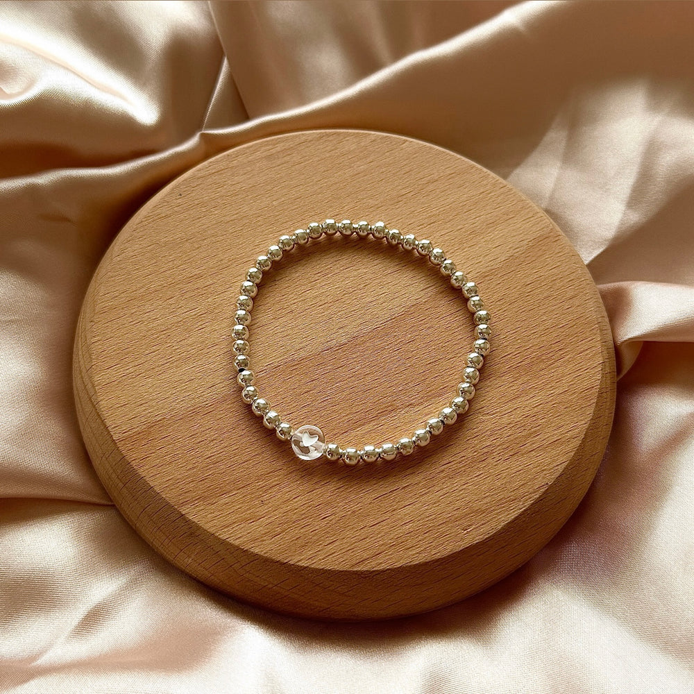 
                      
                        Minimalist clear heart stacking bracelet
                      
                    