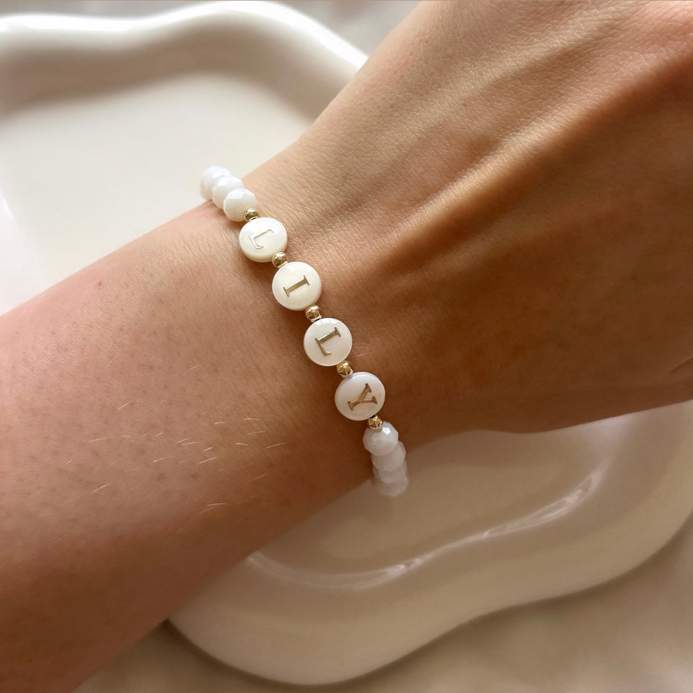 
                      
                        Frosted Crystal Pearl Letter Name Bracelet
                      
                    