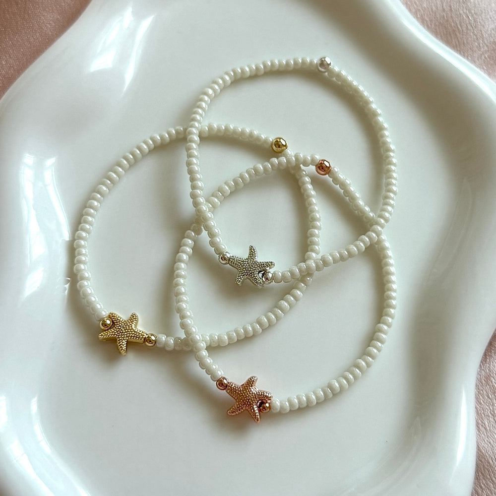 
                      
                        Starfish charm bracelet
                      
                    