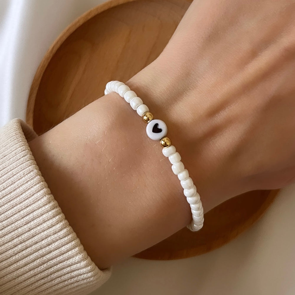 
                      
                        Simple heart stacking bracelet - pearl white
                      
                    