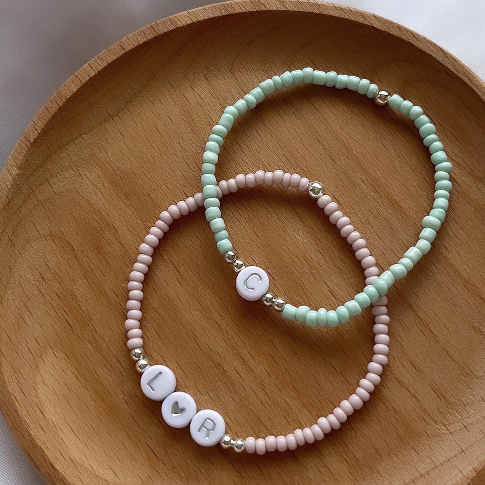 
                      
                        Minimalist neutral initial bracelet - Positively Beaded
                      
                    