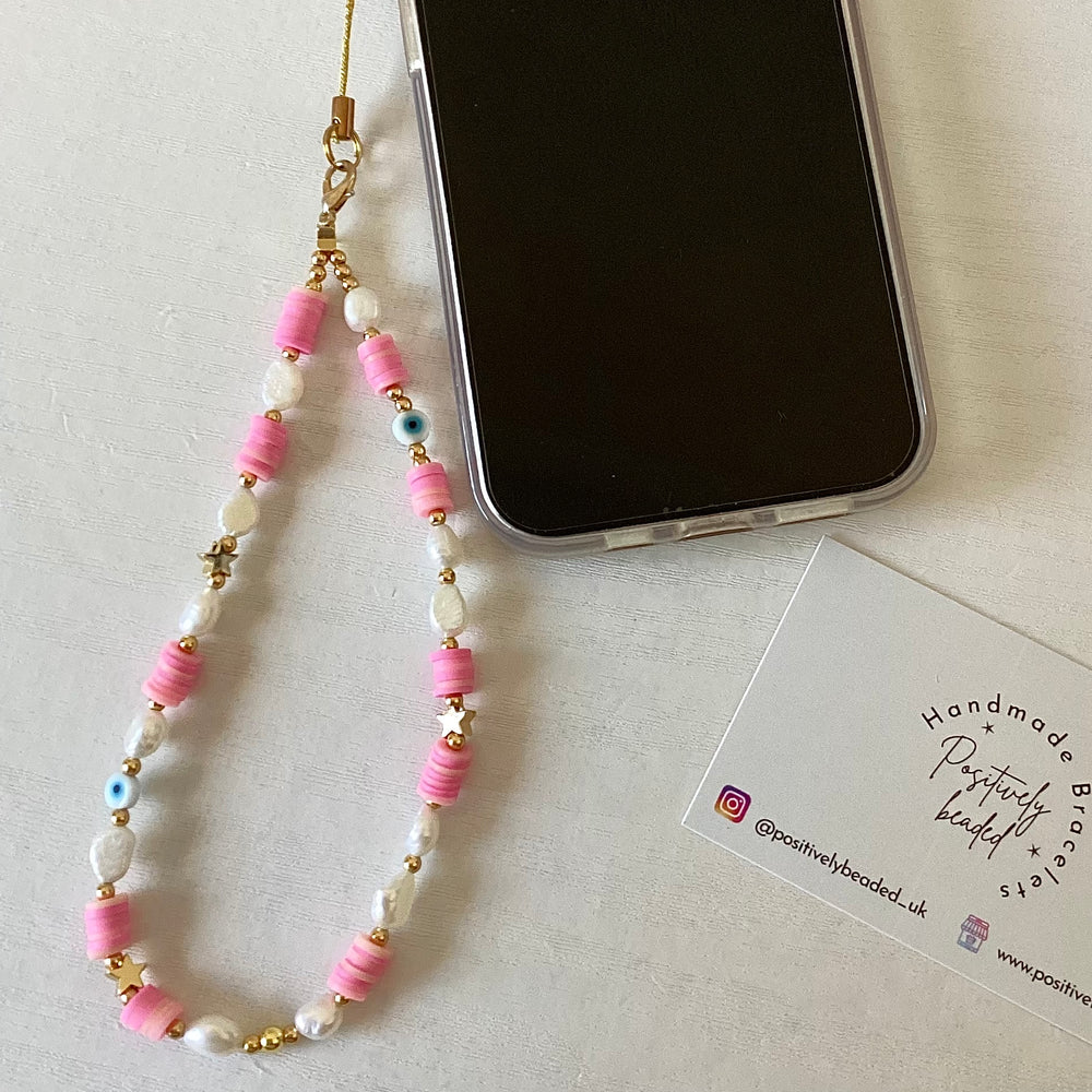 
                      
                        Beaded phone strap - heishi pearl
                      
                    