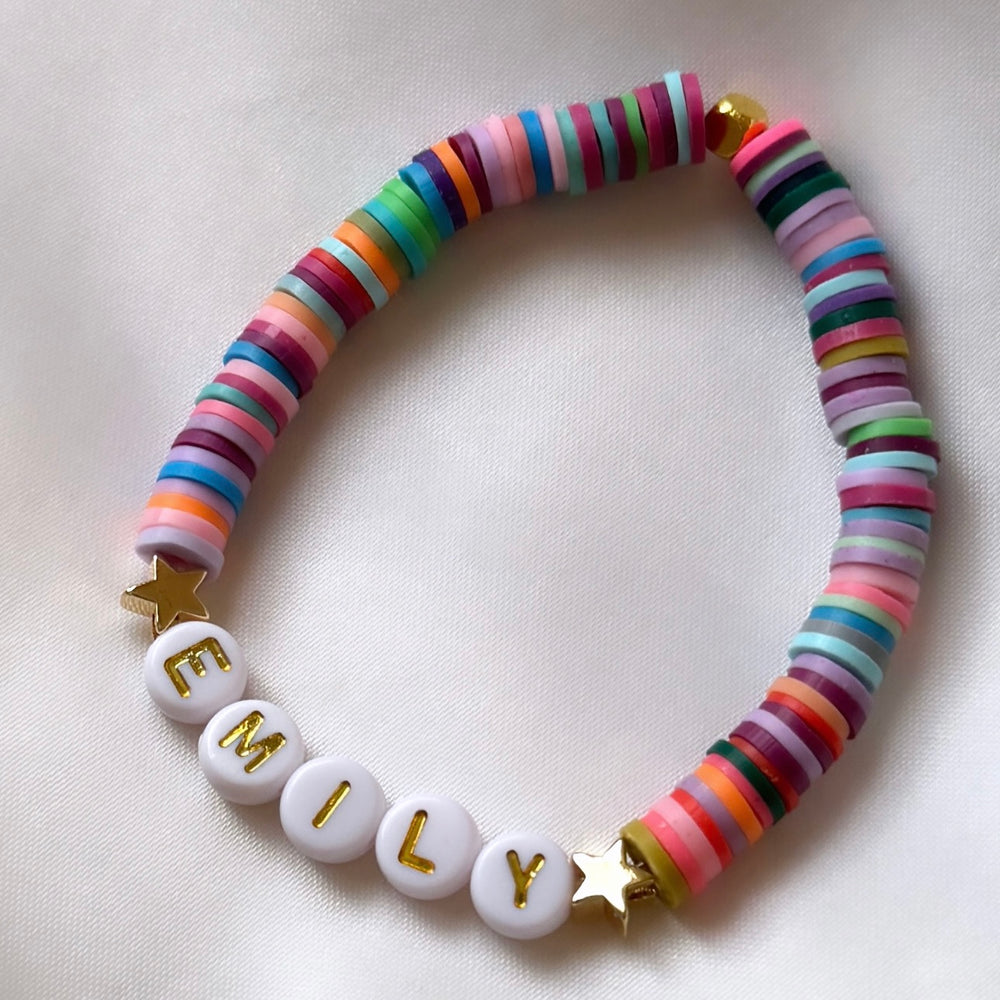 
                      
                        Rainbow and gold personalised heishi bracelet
                      
                    