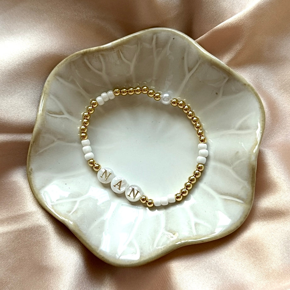 Freshwater pearl and gold name bracelet
